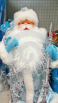 Grandfather Frost Santa Claus, St. Nicholas, Joulupukki with gifts. The symbol of the New year and Christmas. Christmas toy.