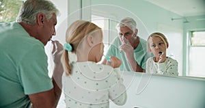 Grandfather, grandchild and brushing teeth, mirror and dental, morning routine in bathroom and hygiene. Toothbrush