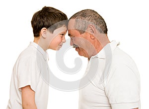 Grandfather and grandchildren knock heads together