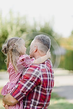 grandfather with granddaughter. Multi generation family enjoying in the park