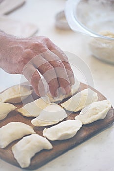 Grandfather and granddaughter sifted flour