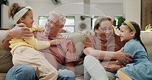 Grandfather, grandmother and children in lounge, happy and excited for bonding on couch. Young girls, man and woman with