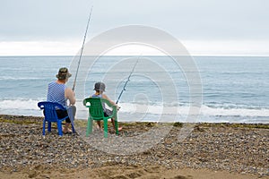 Grandfather and grandson go fishing