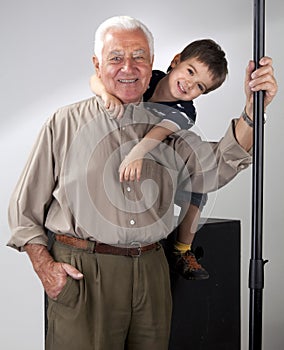 Grandfather and grandson posing