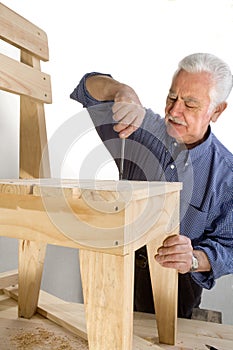 Grandfather makes a chair