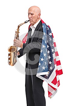 Grandfather playing the saxophone on a white isolated background