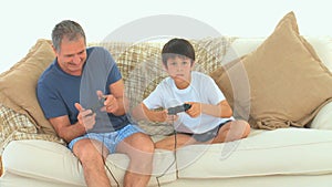 A grandfather playing video games