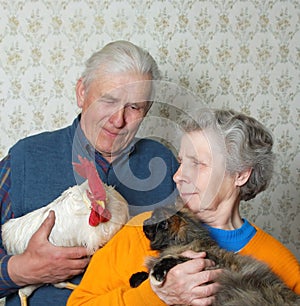 Grandfather with rooster and grandmother with puss