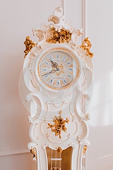 Grandfather`s clock on white