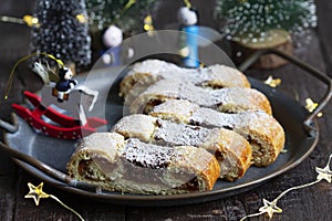 Grandfather's mustache cookies made from shortcrust pastry filled with nuts, jam and cocoa, Christmas toys and