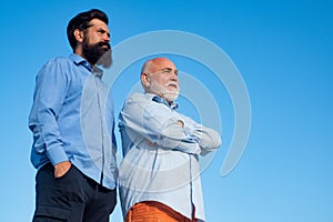 Grandfather with son in park. Family generation: future dream and people concept. Grandpa retiree. Fathers day.