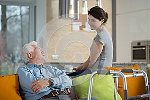 Grandfather talking with loved granddaughter