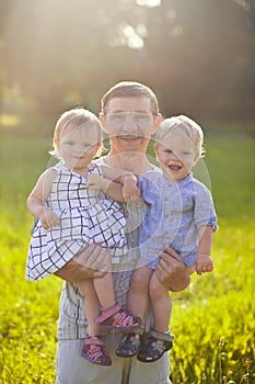 Grandfather with twins grandchildren