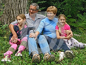 Grandma and grandpa with the grandchildren