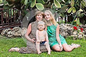 Grandma, grandson and granddaughter in the Park