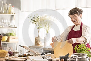 Grandma making a dough photo