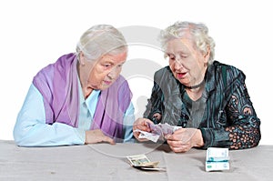 Grandmas are counting money.