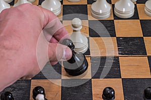 Grandmaster playing chess on a chessboard