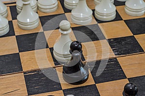 Grandmaster playing chess on a chessboard