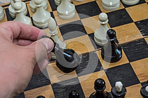 Grandmaster playing chess on a chessboard