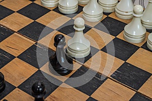 Grandmaster playing chess on a chessboard