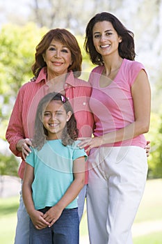 Grandmother with adult daughter and grandchild