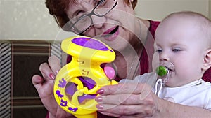 Grandmother and baby girl playing