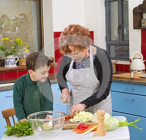 Grandmother and grandchild cooking