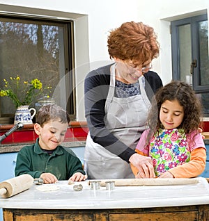 Grandmother and grandchilds baking