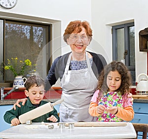 Grandmother and grandchilds baking