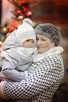 Grandmother With Granddaughter At Christmas