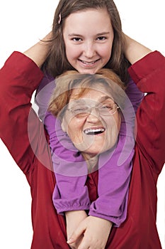 Grandmother and granddaughter hugging