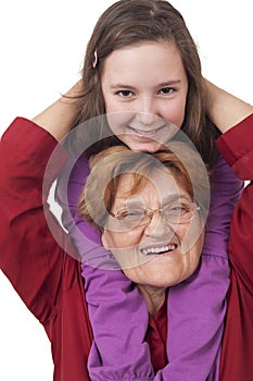 Grandmother and granddaughter hugging