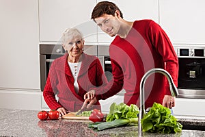 Grandmother with grandson in kitchen