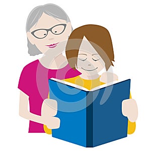 Grandmother and grandson reading a book together