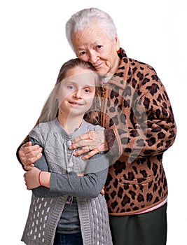 Grandmother hugging her granddaughter