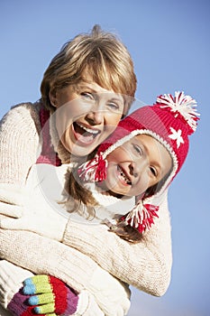 Grandmother Hugging Her Granddaughter