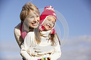 Grandmother Hugging Her Granddaughter