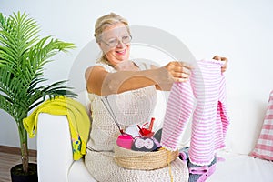 Grandmother knitting at home