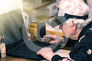 Grandmother learns to work at home on the computer