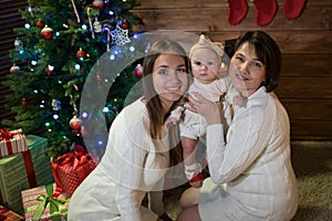 Grandmother mom and granddaughter in christmas