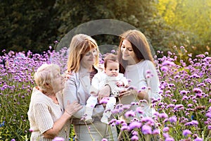 Grandmother, mother and kids. Family generations