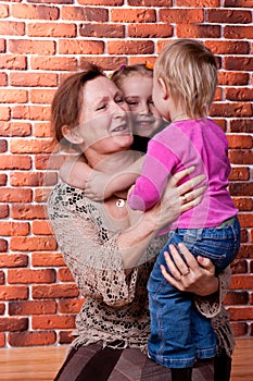 Grandmother playing with her grandchildren