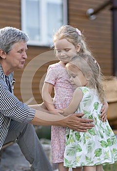 Grandmother plays with her granddaughter