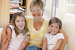 Grandmother posing with grandchildren photo