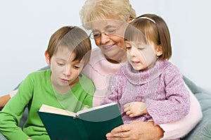 Grandmother reading a book