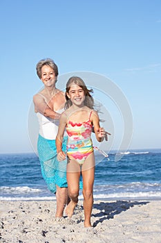 Grandmother Running With Granddaughter