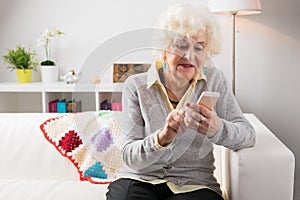 Grandmother using mobile phone
