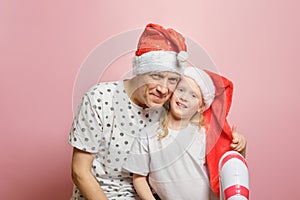 grandpa and granddaughter have fun on the eve of christmas