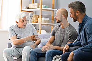 Grandpa Talking With Grandson And Son